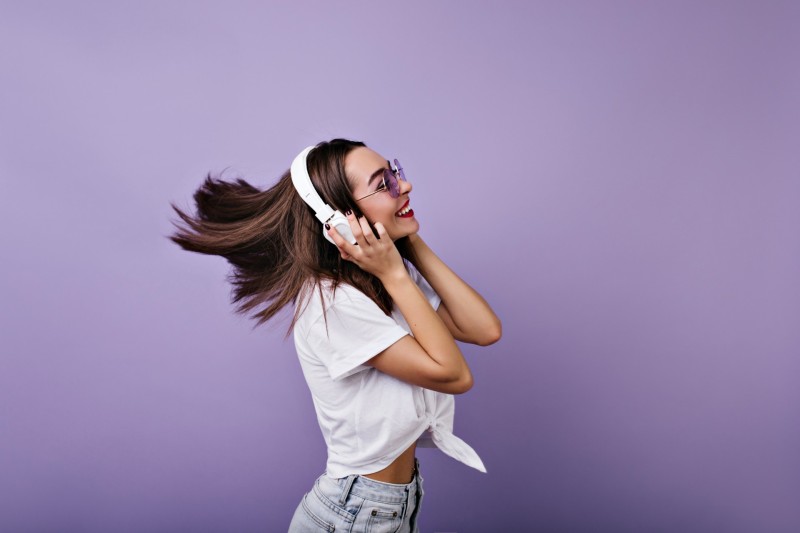 Fascinating girl with headphones